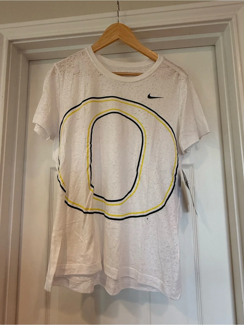 Nike White Short-Sleeve Tee with Yellow & Black 'O' Graphic